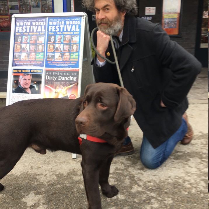 Dougal and his dog outside Pitlochry Festival Theatre with author Fiona Rintoul's beautiful chocolate labrador.