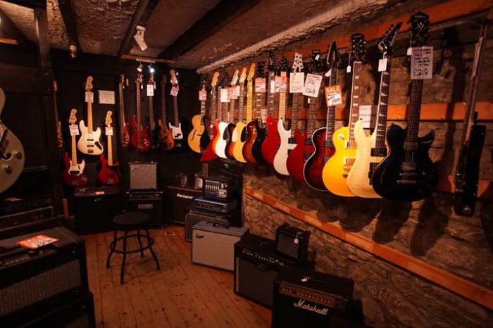 Bandwagon - Guitars on wall