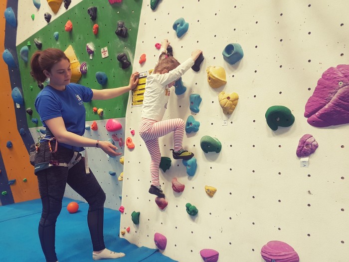 Climbing uses toddler core strength, grip and problem solving in one!
