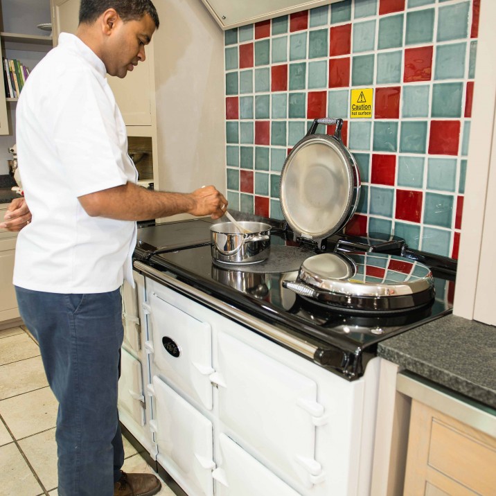 Praveen Kumar of Tabla Restaurant demonstrating how to make Railway Bolti