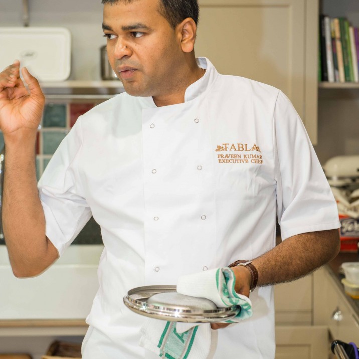 Praveen Kumar of Tabla Restaurant demonstrating how to make Railway Bolti