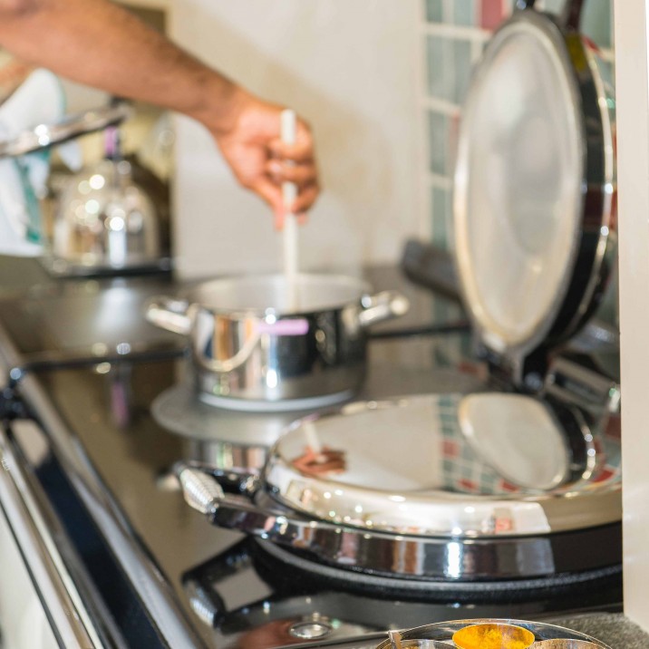 Praveen Kumar of Tabla Restaurant demonstrating how to make Railway Bolti.