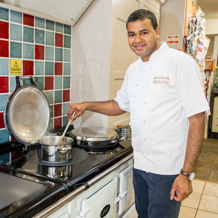 Praveen Kumar of Tabla Restaurant demonstrating how to make Railway Bolti.
