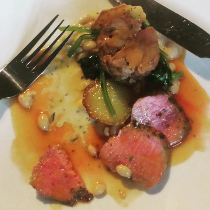 Lamb two ways, slow braised shoulder with carved loin, haricots blanc, thyme roasted potato and a rosemary jus