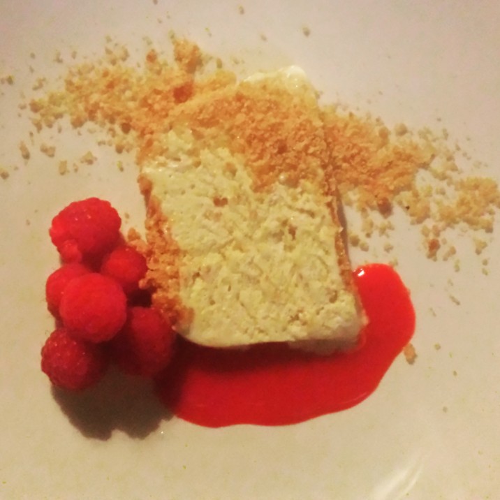 Iced praline and amaretto parfait with raspberries