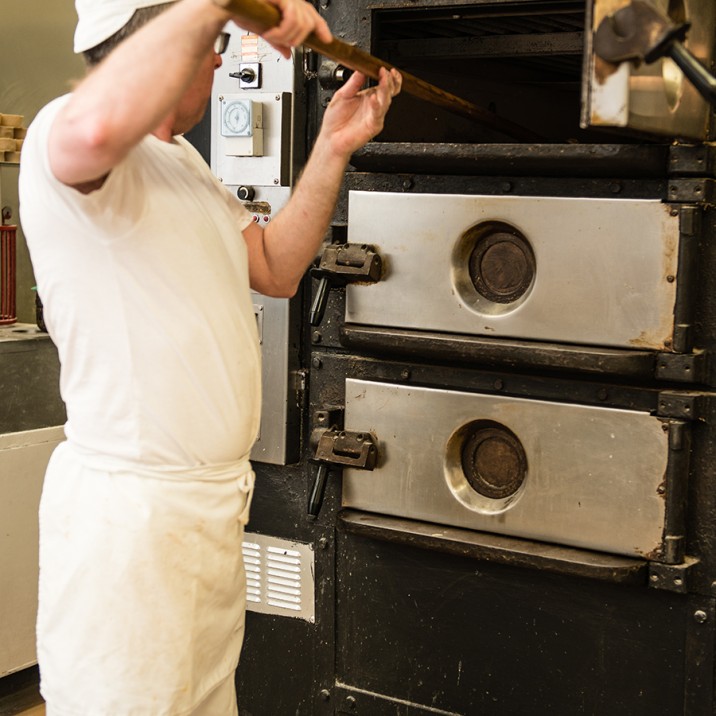 Reaching up for the last of the pies.