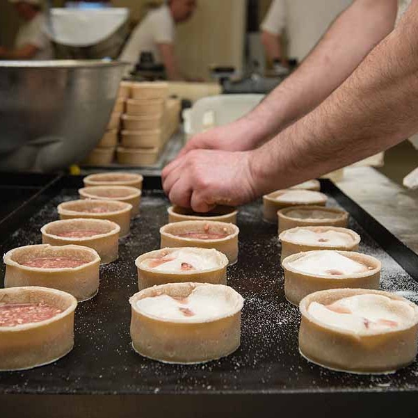 Putting the lids on to lock in the flavour.