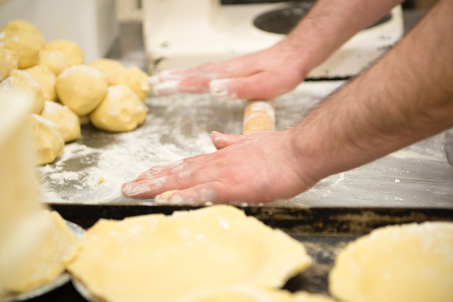 Looks like rolling out of apple pies to me!