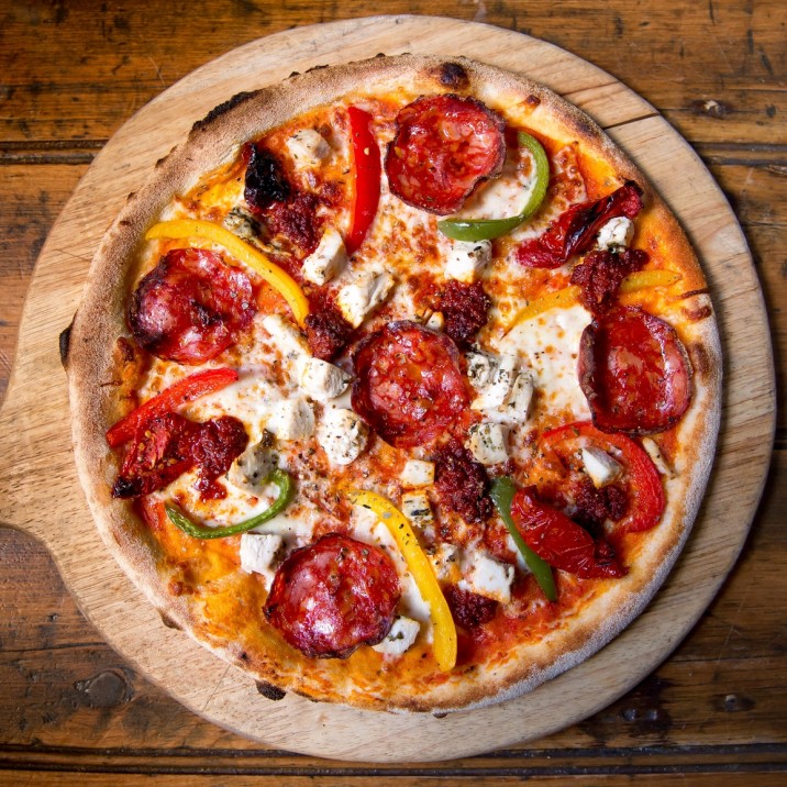 Pizza Mediterranean: Tomato, Mozzarella, Chicken, Spicy Chorizo, Peppers, Sunblushed Tomatoes, N'Duja Sausage