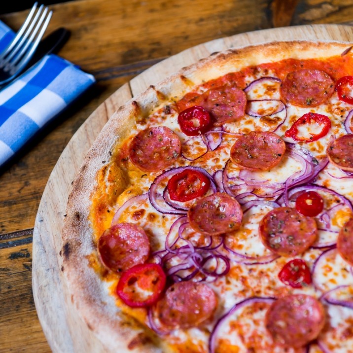 Pizza Diavola: Tomato, Mozzarella, Premium Pepperoni, Red Onions, Roquito Chillies