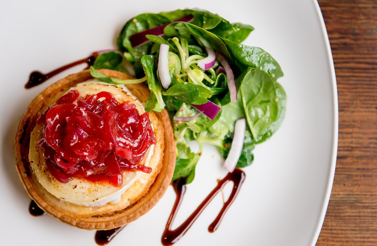 Double Baked Goats Cheese Tartlet with
Sun-blushed tomato & red onion quiche.