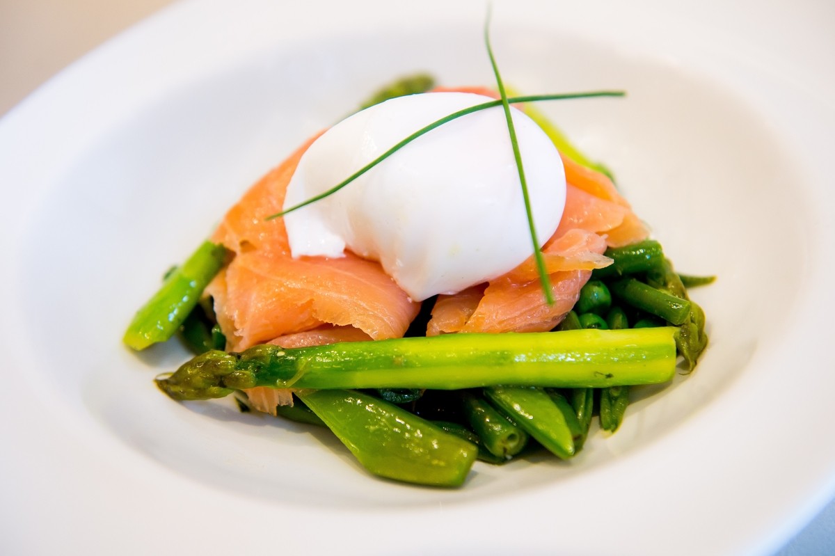Hot green vegetable medley with smoked salmon, all topped with a Gloagburn Farm free range poached egg.
