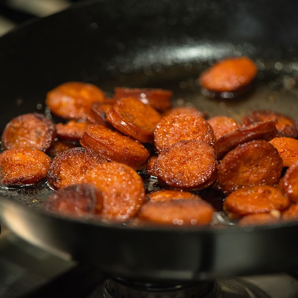 Cod and Chorizo Risotto with the chorizo frying nicely in the pan allowing the tasty juices to run out.