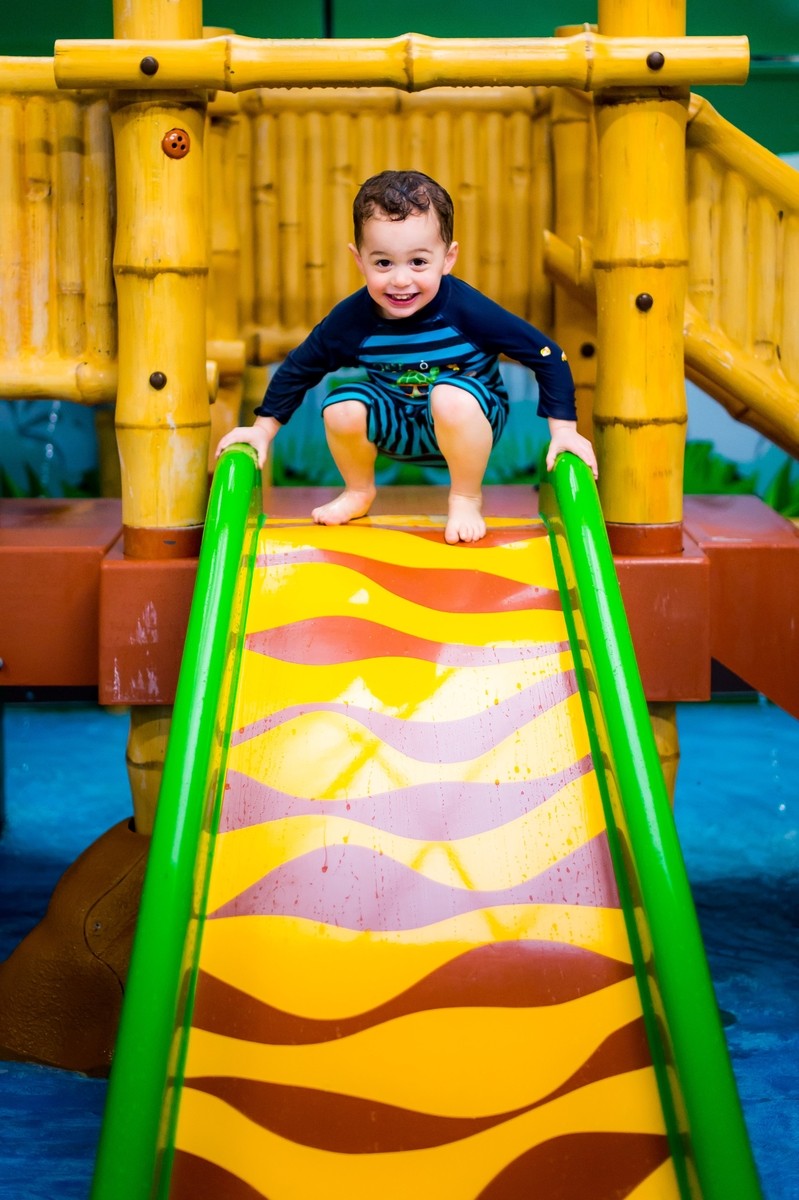 Swim and Skate - Little Boy on Slide