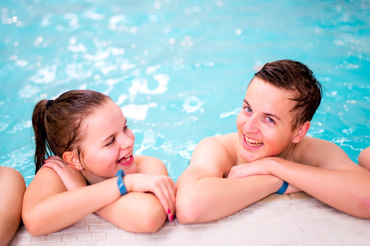 Relaxing at the side of the pool.