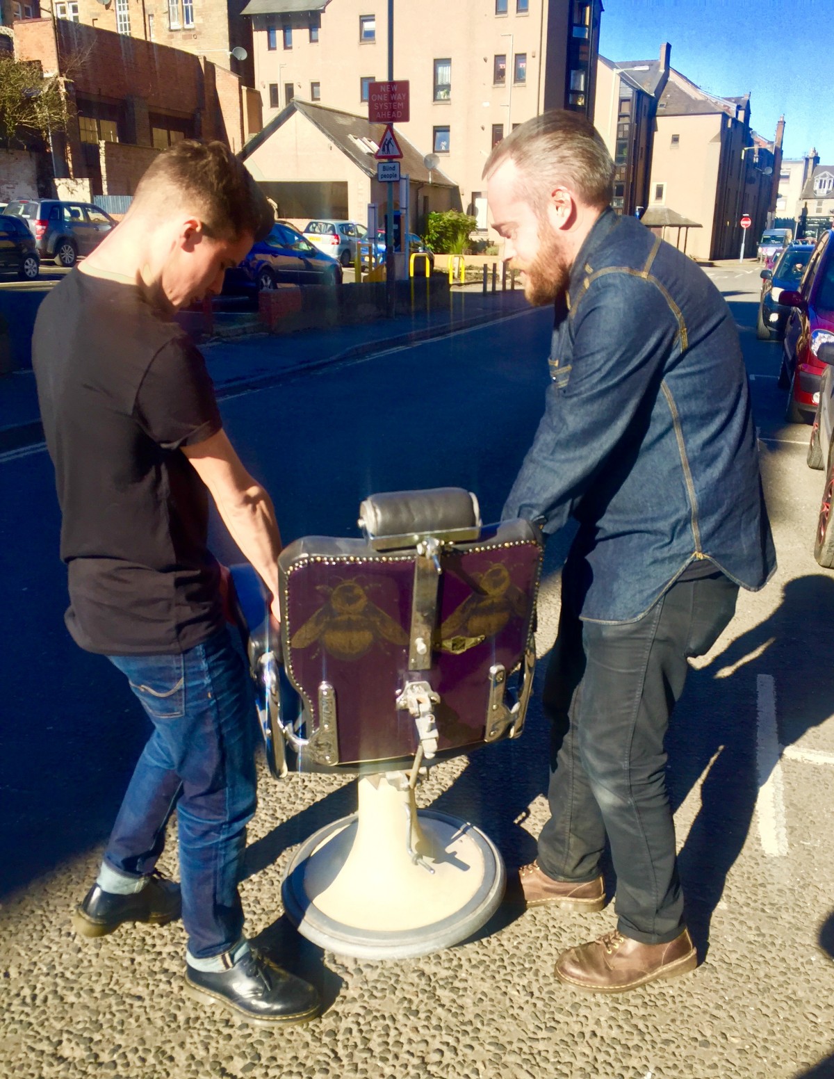 Rae gave his lovely bee printed old fashioned barbers chair to fellow local businessman Grant from Badlands Barber.