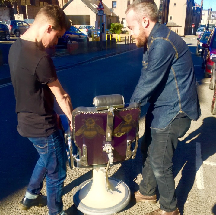 Rae gave his lovely bee printed old fashioned barbers chair to fellow local businessman Grant from Badlands Barber.