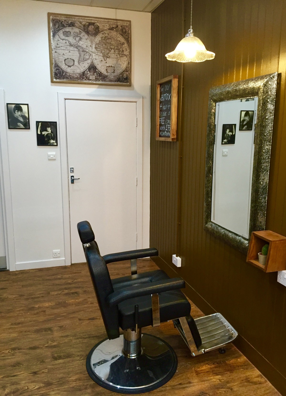 Old fashioned barbers chair in the Rae Peacock Hair Salon.