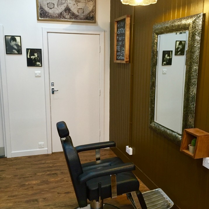 Old fashioned barbers chair in the Rae Peacock Hair Salon.