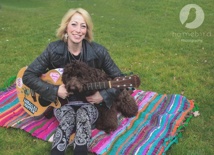 Emma and Dougal chill out for a jam on the grass!