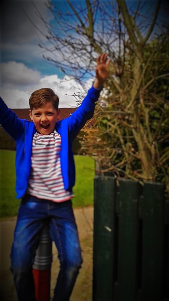 These huge pencils were put next to the mallard and my brother sat on them!