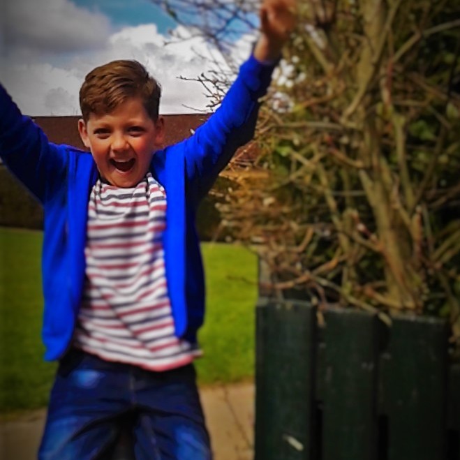 These huge pencils were put next to the mallard and my brother sat on them!