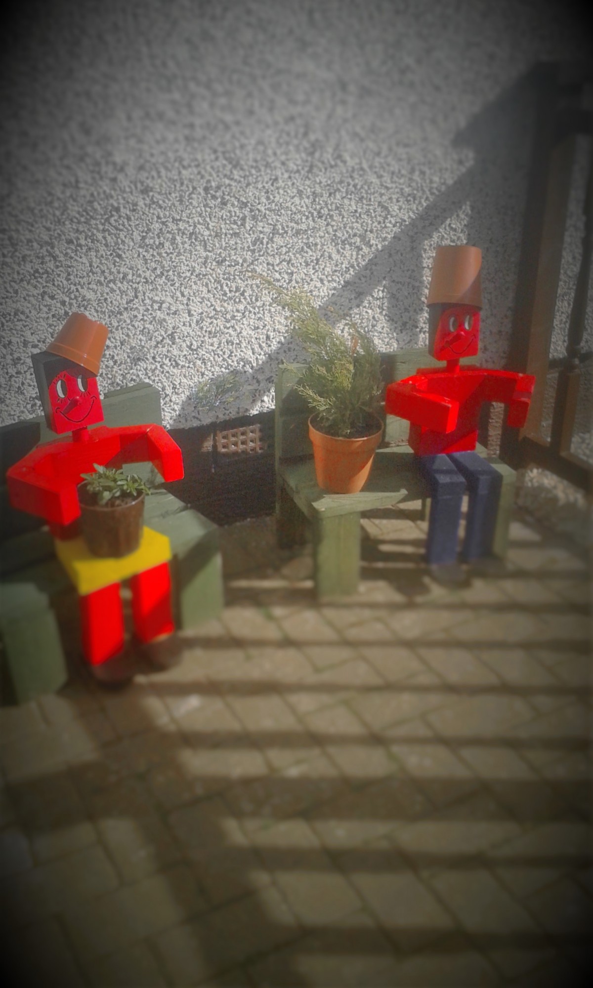 The flower pot men in my back garden - everyone thinks they're ugly!