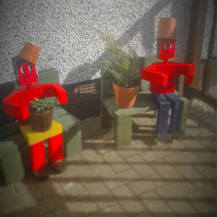 The flower pot men in my back garden - everyone thinks they're ugly!