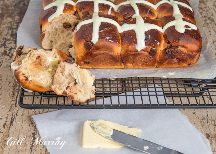 These Choc Chip Hot Cross Buns are a delicious twist on the traditional spiced fruit bun.  We absolutely loved these warmed oozing with chocolate!