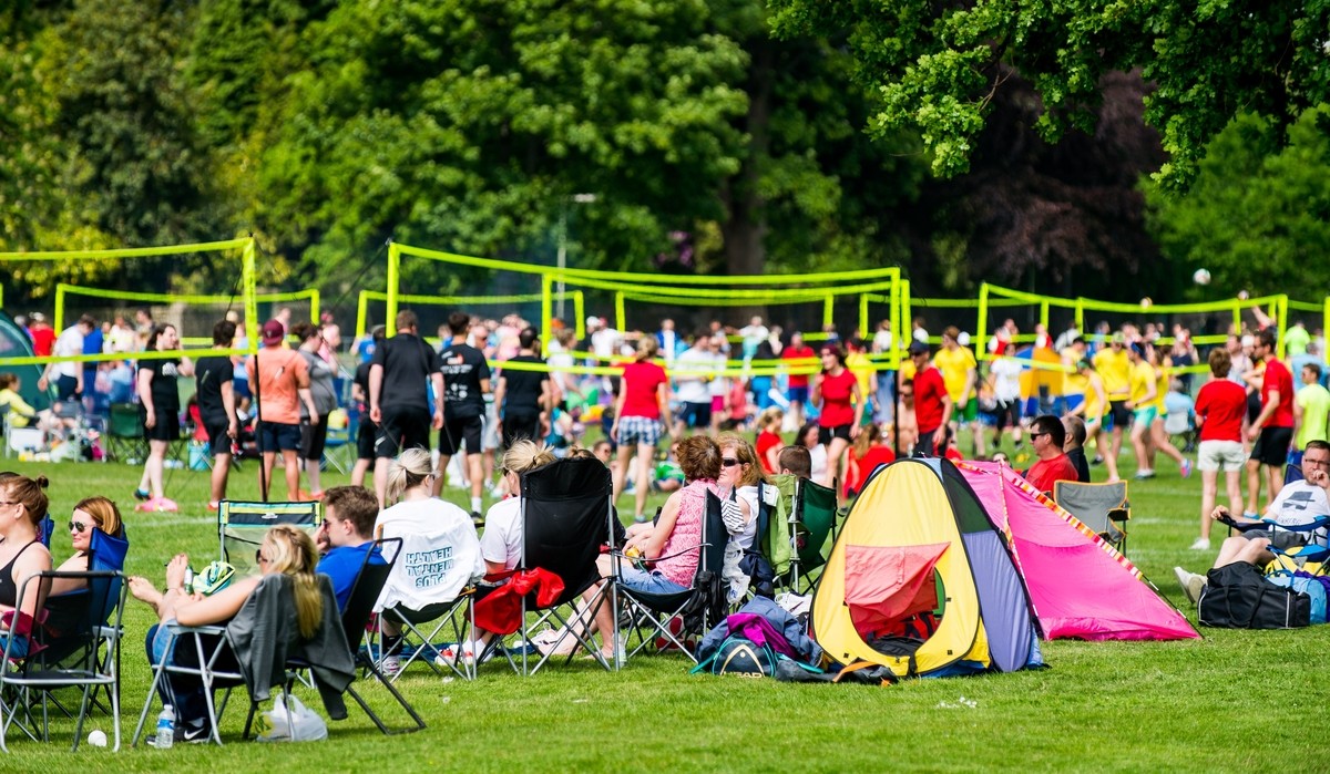 There were lots of spectators basking in the sun and watching the Volleyball.