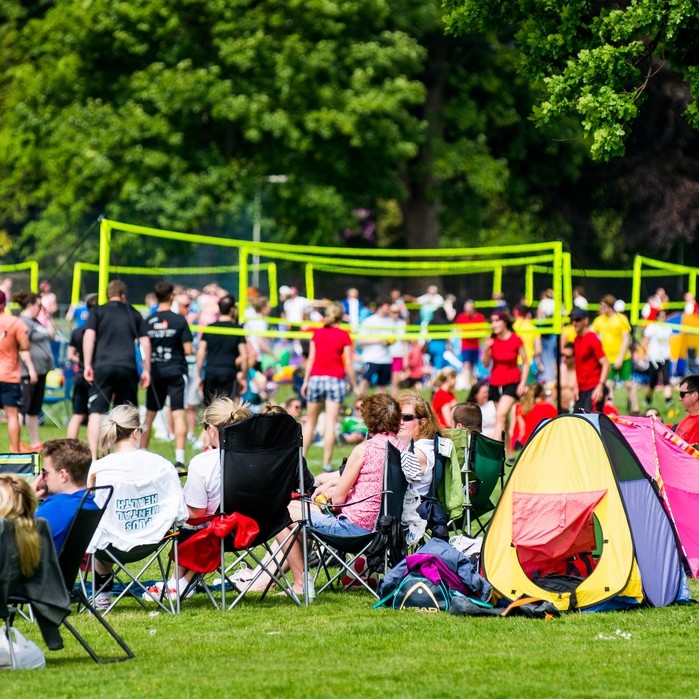 There were lots of spectators basking in the sun and watching the Volleyball.