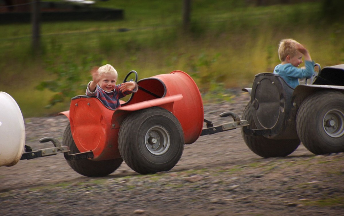 Even the little ones can enjoy the quad experience!  its a conga-line of five off-road pods pulled along by a big, muddy quad bike.