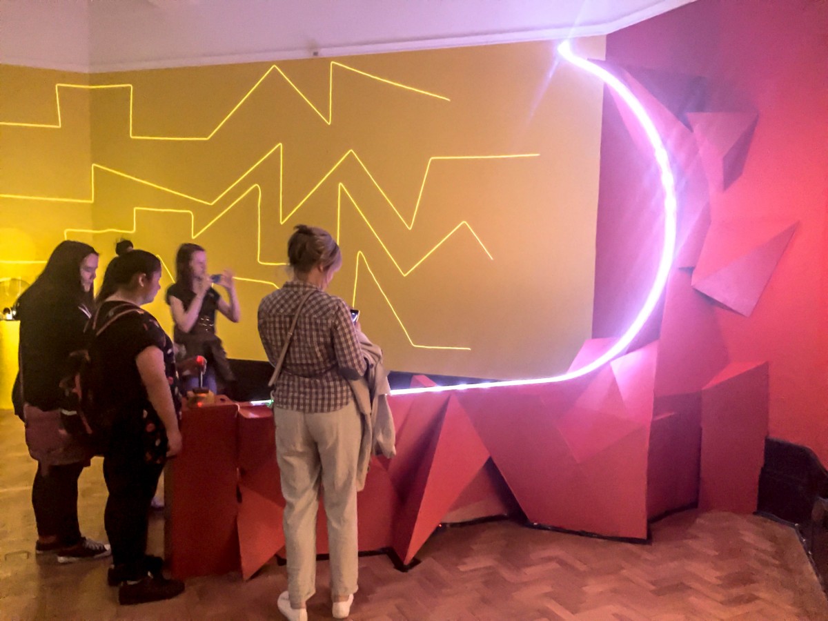 The lighting, props and set of this brilliant exhibition are spectacular.