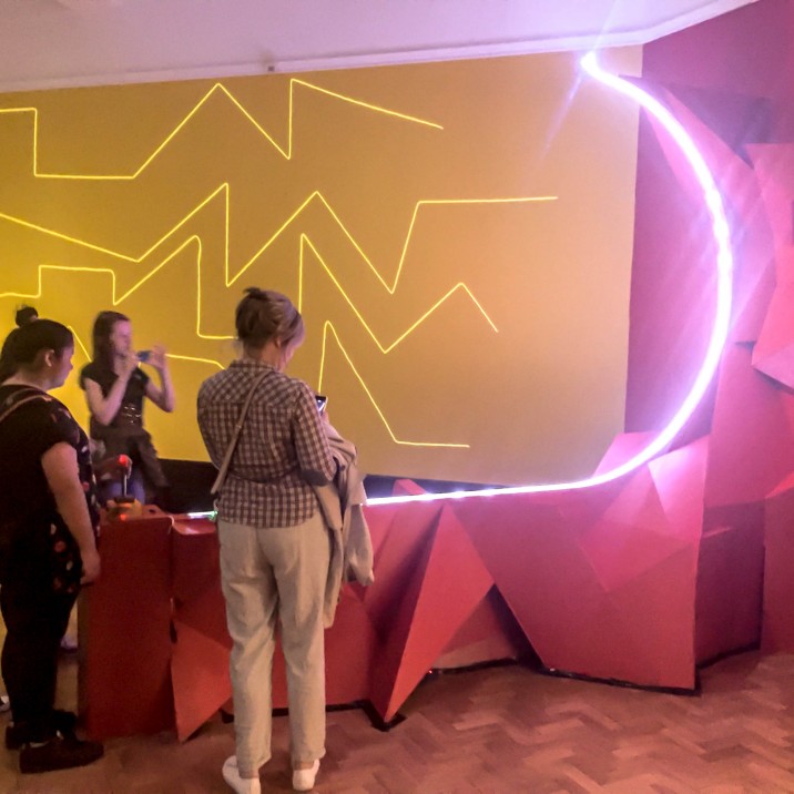 The lighting, props and set of this brilliant exhibition are spectacular.