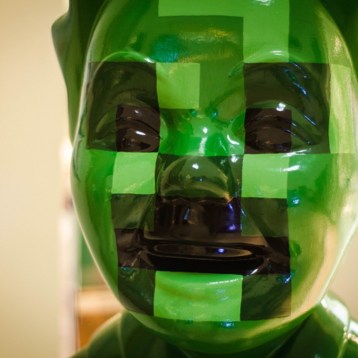 4J studios is a game development studio based in East linton and Dundee who develop the BAFTA winning console version of Mojangs Minecraft. 
This Wullie is based on the Creeper character from Minecraft, an explosive character renowned for wrecking your stuff!