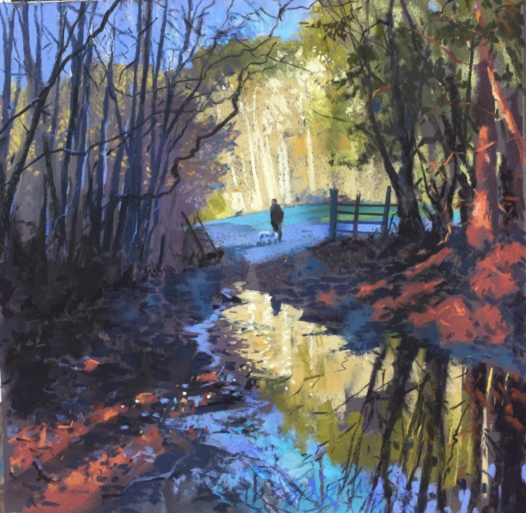 Margaret Evans painted this wonderful woodland scene with the dog and owner in the background. The colours are a great contrast and add reflection and reality to the picture.