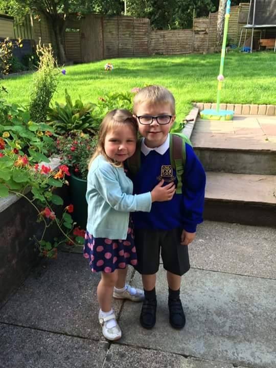 This made our hearts melt! Natalia sent this picture with her little boy all ready for his first day at school and his proud little sister giving him a good luck hug!