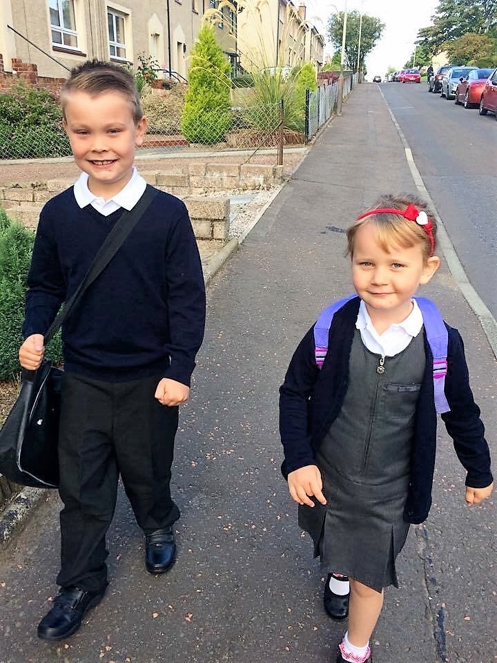 Donna sent in this adorable picture of her little girl being walked to school for her very first day by her super proud big brother!