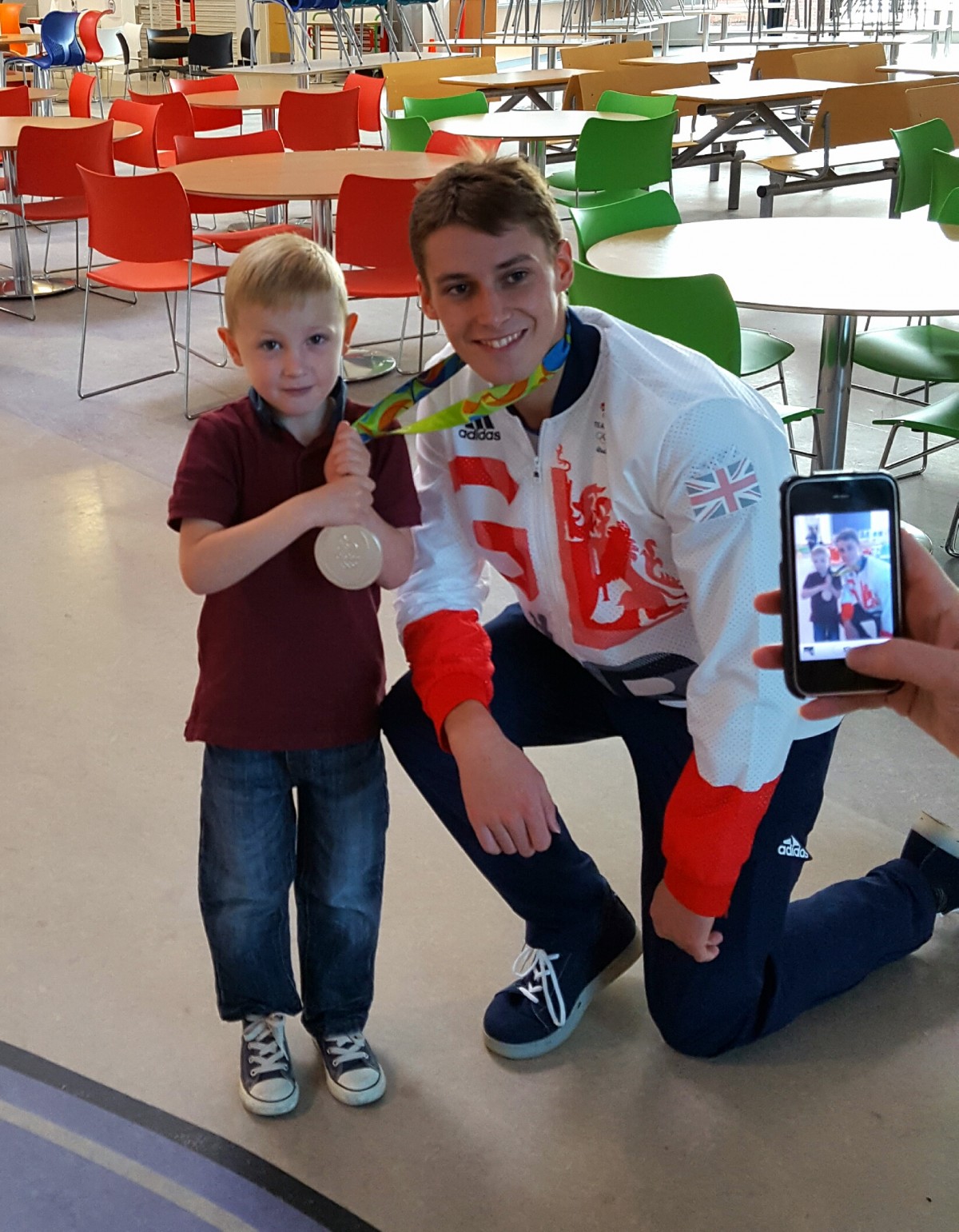 Young and old were delighted to see and (hold!) Stephen shiny Silver Olympic Medal.