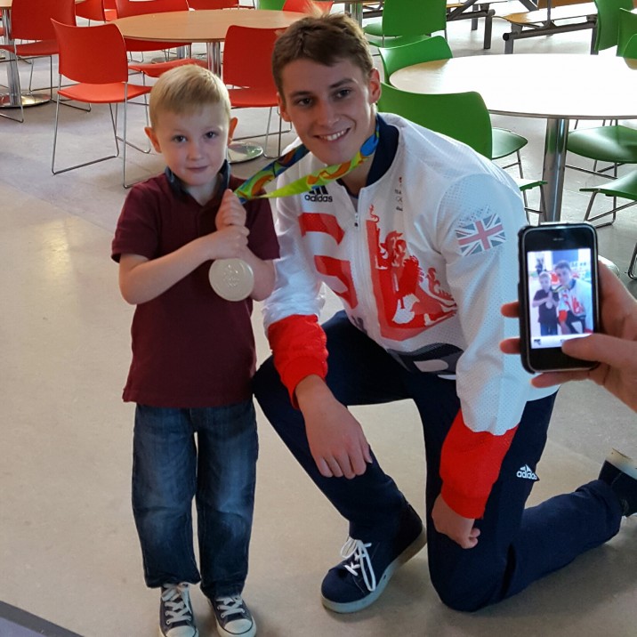 Young and old were delighted to see and (hold!) Stephen shiny Silver Olympic Medal.