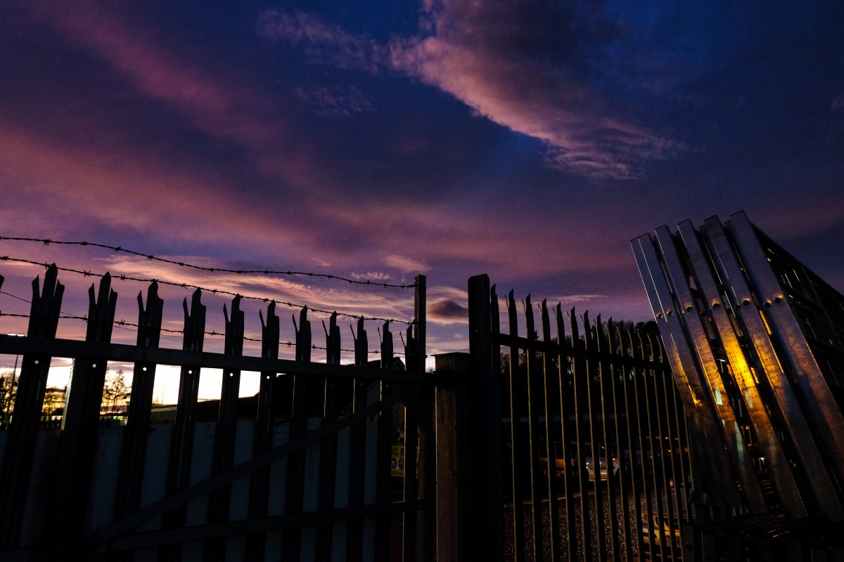 Thanks to Ian Sinclair for this picture.  The black fence is pointing upwards to the violet sky.