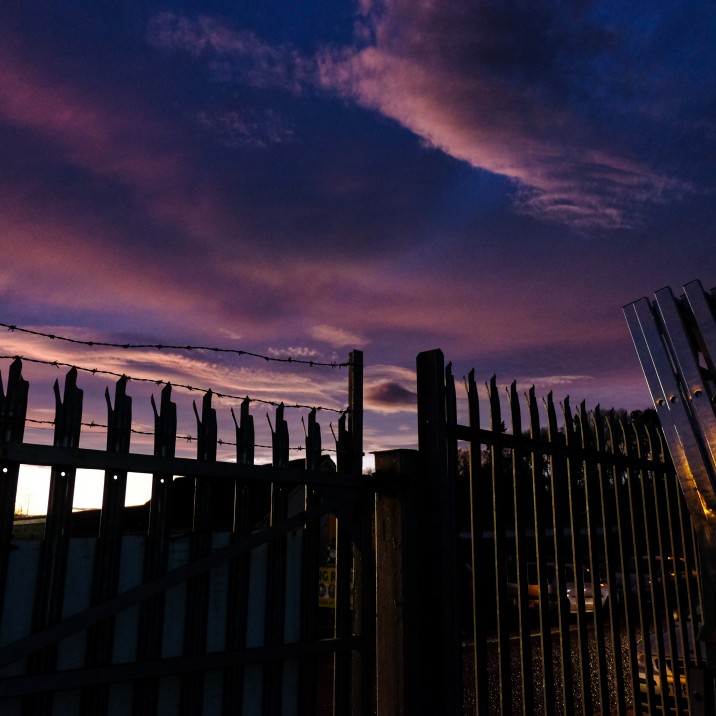 Thanks to Ian Sinclair for this picture.  The black fence is pointing upwards to the violet sky.
