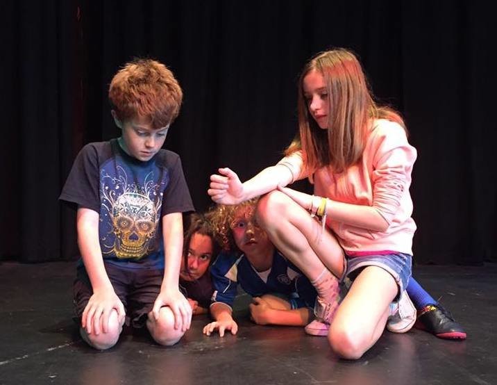 PYT 50th girl and boy kneeling