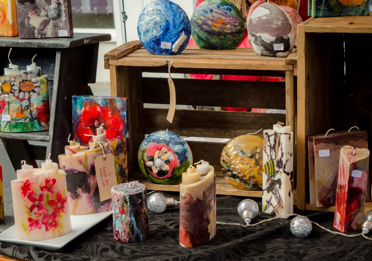 These brightly coloured candles look amazing on the stall at the outdoor festival of Chocolate.