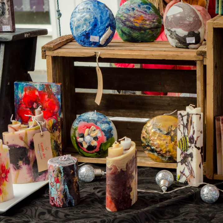 These brightly coloured candles look amazing on the stall at the outdoor festival of Chocolate.