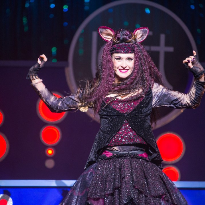 Kitty Cat the rat catcher stands side by side with Dick in the final showdown.