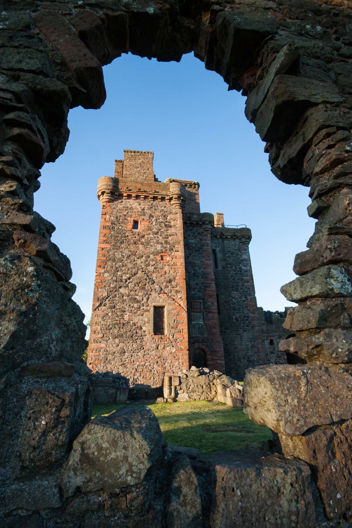 Balvaird Castle looking very grand framed by this stony archway.