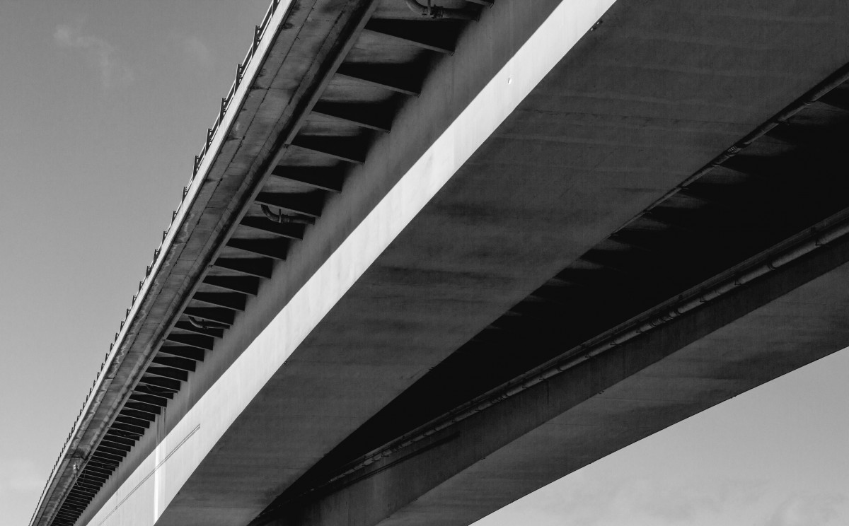 The Friarton bridge in black and white and shot from below.