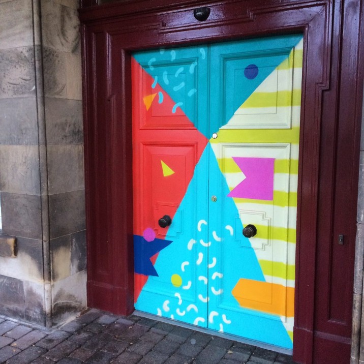 Colourful triangular door.