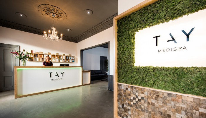 Tay Medispa's warm, inviting reception area sets the tone for your visit.